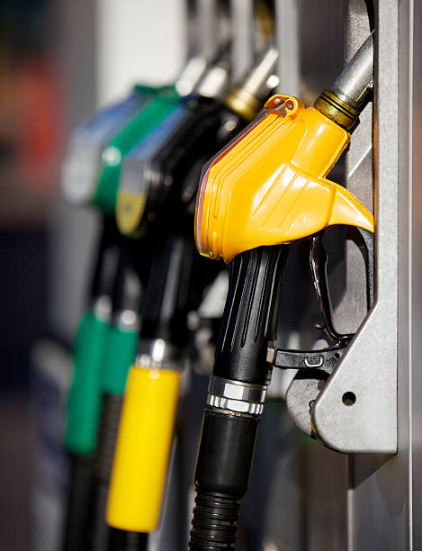 gas nozzles in gas station.